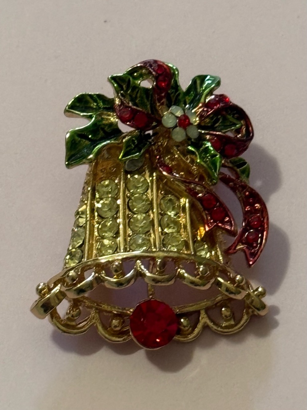 Gold Toned Bell Brooch with Green and Red Accents